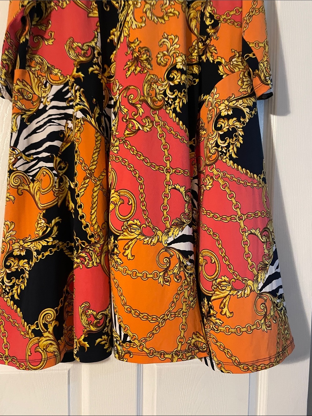 Susan Graver Orange & Black Chain-Print V-Neck Top - Picture 2 of 8